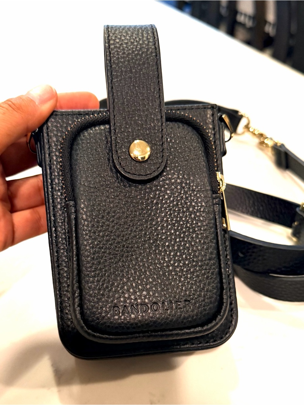 Bandolier Black Leather Crossbody Phone Pouch with Gold Hardware